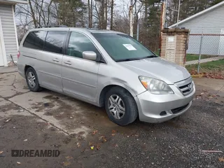 2006 Honda Odyssey EX-L with VIN 5FNRL38656B401515, listed as a IAAI auction lot 40887899 with 241,327 mi miles. Bid and sale history available at carsss.com. Image 1.