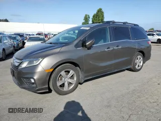 2018 Honda Odyssey EX with VIN 5FNRL6H58JB072505, listed as a Copart auction lot 56509665 with 180,023 mi miles and Salvage title. Bid and sale history available at DreamBid. Image 1.