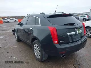 2014 Cadillac SRX Luxury Collection with VIN 3GYFNBE31ES591962, listed as a IAAI auction lot 41948735 with 97,523 mi miles and . Bid and sale history available at carsss.com. Image 3.