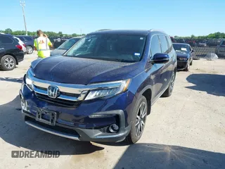 2020 Honda Pilot Elite with VIN 5FNYF6H02LB054348, listed as a IAAI auction lot 42302525 with 43,916 mi miles and . Bid and sale history available at DreamBid. Image 17.