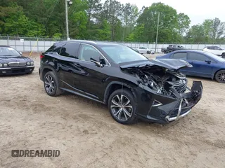 2016 Lexus RX 350 z VIN 2T2ZZMCA8GC005158, wystawiony jako IAAI lot #42105589 z przebiegiem 125 337 mil mil oraz . Historia ofert i sprzedaży dostępna na DreamBid. Obrazek 1.
