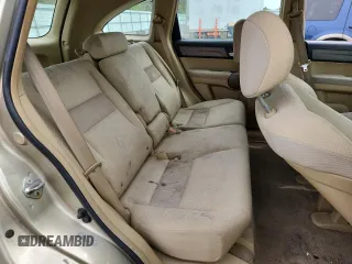 2009 Honda CR-V LX z VIN 5J6RE48309L006028, wystawiony jako Copart lot #58186465 z przebiegiem 214 896 mil mil oraz Szkoda całkowita • Salvage title. Historia ofert i sprzedaży dostępna na DreamBid. Obrazek 11.