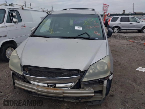 2005 Honda Odyssey EX with VIN 5FNRL38435B071998, listed as a IAAI auction lot 41808601 with 999,999 mi miles. Bid and sale history available at carsss.com. Image 6.