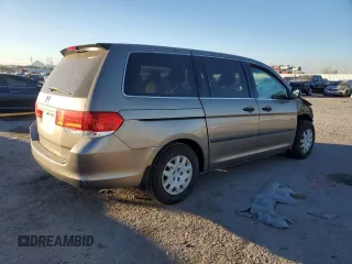 2009 Honda Odyssey LX с VIN 5FNRL38279B025918, выставлен на аукционе Copart как лот 82848404 с пробегом 71 791 миль миль и Списание • Salvage title. История ставок и продаж доступна на DreamBid. Изображение 3.