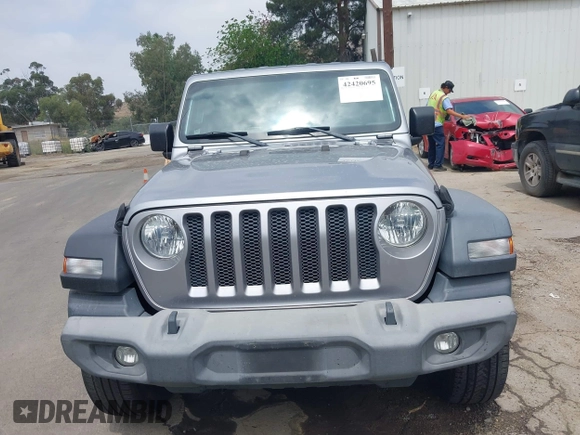 2018 Jeep Wrangler Unlimited Sport S with VIN 1C4HJXDN5JW145340, listed as a IAAI auction lot 42420695 with 92,500 mi miles and . Bid and sale history available at DreamBid. Image 12.