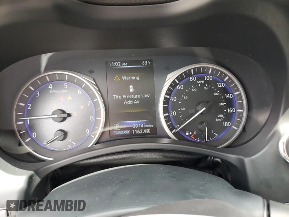 2015 Infiniti Q50 Premium with VIN JN1BV7APXFM344065, listed as a Copart auction lot 61859345 with 39,145 mi miles and Salvage title. Bid and sale history available at DreamBid. Image 9.