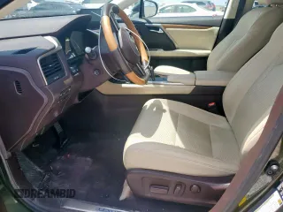 2020 Lexus RX 450h with VIN 2T2HGMDA3LC046646, listed as a Copart auction lot 61030015 with 74,709 mi miles and Salvage title. Bid and sale history available at DreamBid. Image 7.
