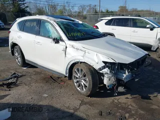 2020 Mazda CX-5 Grand Touring with VIN JM3KFBDM6L0751471, listed as a IAAI auction lot 41914849 with Not Provided miles and . Bid and sale history available at carsss.com. Image 1.