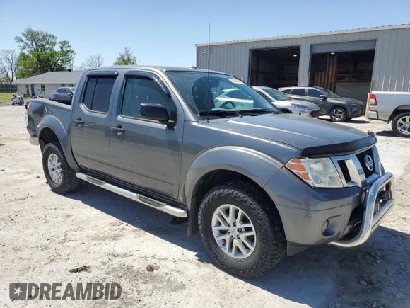 2016 Nissan Frontier SV with VIN 1N6AD0EV0GN790634, listed as a Copart auction lot 52742205 with 190,956 mi miles and Salvage title. Bid and sale history available at DreamBid. Image 4.