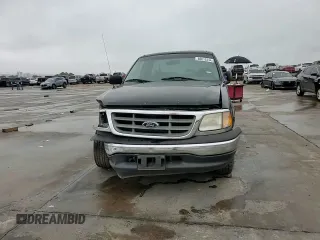 2000 Ford F-150 XL with VIN 3FTZF1728YMA63732, listed as a Copart auction lot 80010344 with Not provided miles and Salvage title. Bid and sale history available at DreamBid. Image 10.
