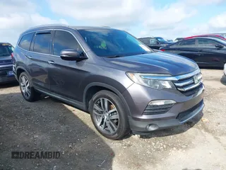 2017 Honda Pilot Elite with VIN 5FNYF6H05HB020704, listed as a IAAI auction lot 42472314 with 136,154 mi miles and . Bid and sale history available at DreamBid. Image 1.