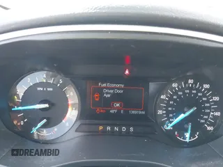 2015 Ford Fusion SE with VIN 3FA6P0H98FR267586, listed as a IAAI auction lot 41987958 with 136,919 mi miles. Bid and sale history available at carsss.com. Image 7.