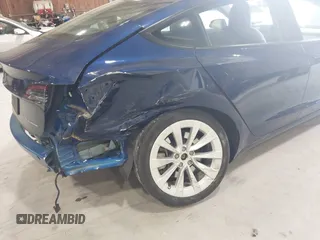 2022 Tesla Model 3 Long Range with VIN 5YJ3E1EB8NF255163, listed as a IAAI auction lot 42105451 with 40,166 mi miles and . Bid and sale history available at DreamBid. Image 6.