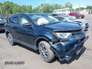2018 Toyota RAV4 LE with VIN JTMBFREV3JJ176097, listed as a IAAI auction lot 42551800 with 50,987 mi miles and . Bid and sale history available at DreamBid. Image 1.