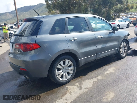 2012 Acura RDX Tech Pkg with VIN 5J8TB2H58CA002131, listed as a IAAI auction lot 41880892 with 140,115 mi miles. Bid and sale history available at carsss.com. Image 4.