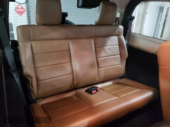 2011 Jeep Wrangler Sahara with VIN 1J4AA5D19BL577347, listed as a Copart auction lot 80340124 with 148,986 mi miles and Salvage Title. Bid and sale history available at DreamBid. Image 10.