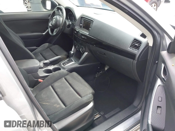 2014 Mazda CX-5 Touring with VIN JM3KE2CY3E0429025, listed as a IAAI auction lot 41680713 with 113,065 mi miles. Bid and sale history available at carsss.com. Image 5.