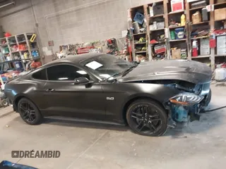 2023 Ford Mustang GT with VIN 1FA6P8CF8P5305334, listed as a IAAI auction lot 41858115 with 23,574 mi miles and . Bid and sale history available at DreamBid. Image 14.