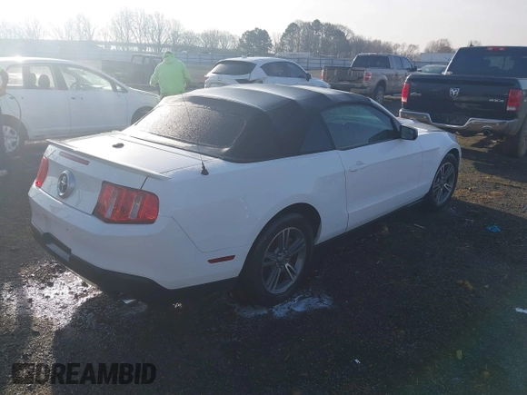 2012 Ford Mustang V6 with VIN 1ZVBP8EM0C5212707, listed as a IAAI auction lot 41775024 with 144,116 mi miles and . Bid and sale history available at carsss.com. Image 4.