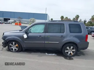 2015 Honda Pilot Touring with VIN 5FNYF3H91FB011847, listed as a IAAI auction lot 41841293 with 99,431 mi miles. Bid and sale history available at carsss.com. Image 15.