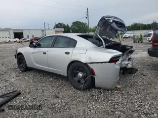 2019 Dodge Charger Police with VIN 2C3CDXATXKH627424, listed as a Copart auction lot 61445815 with 122,296 mi miles and Salvage title. Bid and sale history available at DreamBid. Image 2.
