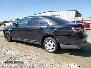 2014 Ford Taurus SEL with VIN 1FAHP2E84EG155311, listed as a Copart auction lot 51813125 with 156,611 mi miles and Salvage Title. Bid and sale history available at carsss.com. Image 2.