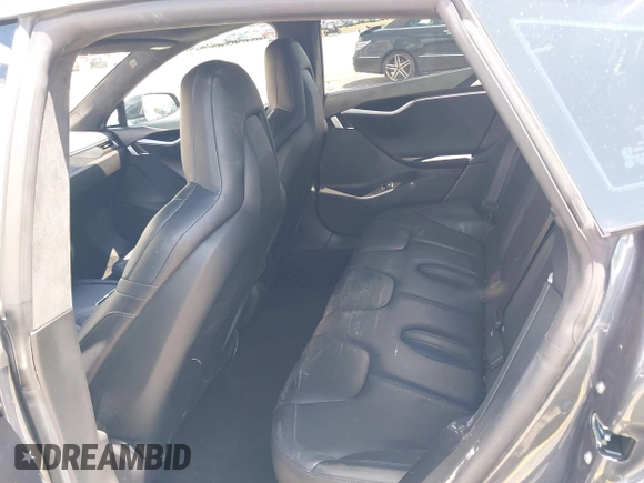 2016 Tesla Model S 70 with VIN 5YJSA1E16GF156312, listed as a IAAI auction lot 42469451 with 90,317 mi miles and . Bid and sale history available at DreamBid. Image 8.