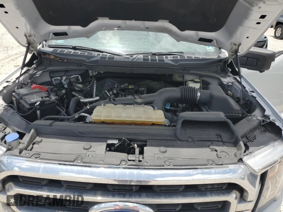 2021 Ford F-150 XL with VIN 1FTEW1CP2MKE62928, listed as a Copart auction lot 59882525 with 32,481 mi miles and Salvage title. Bid and sale history available at DreamBid. Image 11.