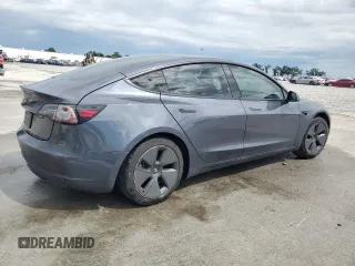 2023 Tesla Model 3 с VIN 5YJ3E1EA7PF449077, выставлен на аукционе Copart как лот 56821975 с пробегом 42 037 миль миль и Списание • Salvage title. История ставок и продаж доступна на DreamBid. Изображение 3.