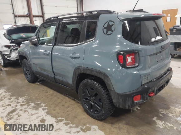 2017 Jeep Renegade Trailhawk z VIN ZACCJBCB4HPE86966, wystawiony jako IAAI lot #41502978 z przebiegiem 144 723 mil mil oraz . Historia ofert i sprzedaży dostępna na DreamBid. Obrazek 3.