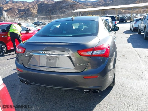 2016 Maserati Ghibli with VIN ZAM57XSA8G1176410, listed as a IAAI auction lot 41180917 with NaN miles. Bid and sale history available at carsss.com. Image 16.