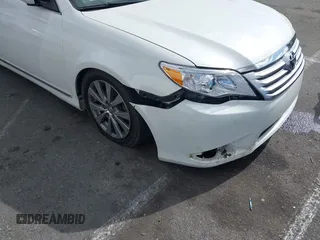2011 Toyota Avalon with VIN 4T1BK3DB5BU403902, listed as a IAAI auction lot 41472945 with 175,685 mi miles and . Bid and sale history available at DreamBid. Image 6.