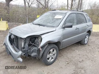 2009 Kia Sportage LX with VIN KNDJF724997570871, listed as a IAAI auction lot 41003267 with 231,654 mi miles and . Bid and sale history available at carsss.com. Image 2.