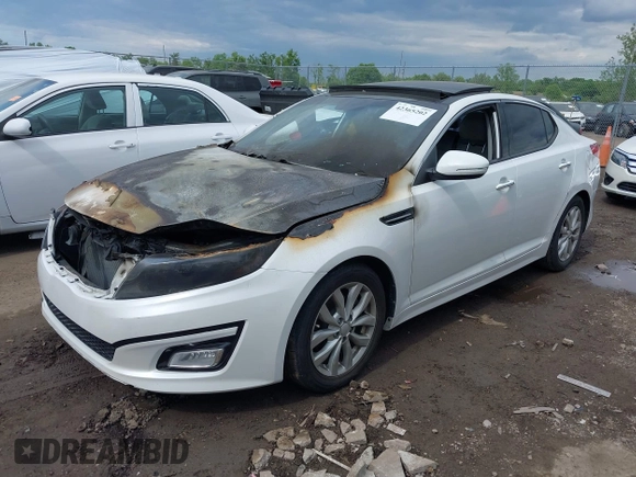 2015 Kia Optima EX with VIN 5XXGN4A71FG356581, listed as a IAAI auction lot 42365202 with Not provided miles and . Bid and sale history available at DreamBid. Image 2.