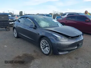 2021 Tesla Model 3 Long Range with VIN 5YJ3E1EB6MF975916, listed as a IAAI auction lot 40713749 with 29,593 mi miles and . Bid and sale history available at DreamBid. Image 1.