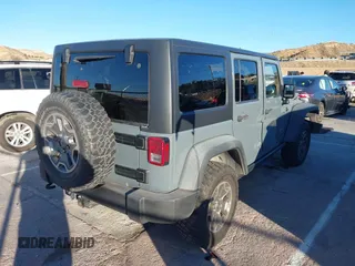 2014 Jeep Wrangler Unlimited Rubicon X with VIN 1C4BJWFG3EL134522, listed as a IAAI auction lot 41221381 with 66,897 mi miles and . Bid and sale history available at DreamBid. Image 4.