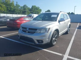 2013 Dodge Journey SXT with VIN 3C4PDCBG2DT661360, listed as a IAAI auction lot 42742522 with 155,973 mi miles and . Bid and sale history available at DreamBid. Image 2.