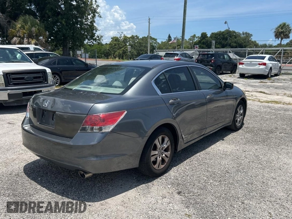 2009 Honda Accord LX-P with VIN 1HGCP26419A165093, listed as a Copart auction lot 61976585 with 172,398 mi miles and Clean title. Bid and sale history available at DreamBid. Image 4.