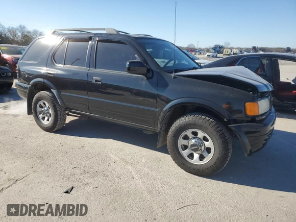 1999 Isuzu Rodeo S with VIN 4S2CK58W2X4336401, listed as a Copart auction lot 83872484 with 191,278 mi miles and Salvage title. Bid and sale history available at DreamBid. Image 4.