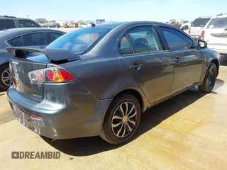 2010 Mitsubishi Lancer DE with VIN JA32U1FU1AU033241, listed as a IAAI auction lot 41805976 with 214,606 mi miles. Bid and sale history available at carsss.com. Image 4.