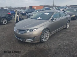 2015 Lincoln MKZ with VIN 3LN6L2J98FR620089, listed as a IAAI auction lot 41805555 with Not provided miles and . Bid and sale history available at DreamBid. Image 16.