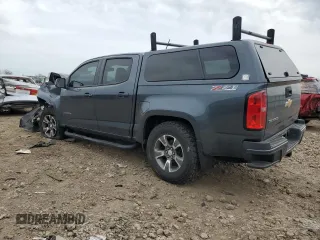 2015 Chevrolet Colorado 4WD Z71 z VIN 1GCGTCE37F1236156, wystawiony jako Copart lot #54987475 z przebiegiem 198 656 mil mil oraz Szkoda całkowita • Salvage title. Historia ofert i sprzedaży dostępna na DreamBid. Obrazek 2.
