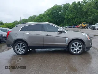 2012 Cadillac SRX Premium Collection z VIN 3GYFNCE3XCS620507, wystawiony jako IAAI lot #42348835 z przebiegiem 184 737 mil mil oraz . Historia ofert i sprzedaży dostępna na DreamBid. Obrazek 13.