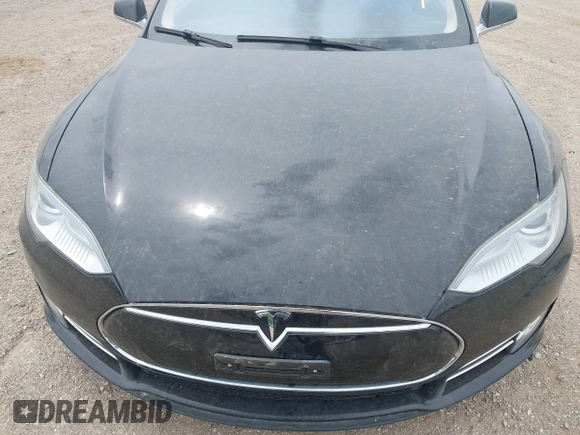2013 Tesla Model S с VIN 5YJSA1CN1DFP08848, выставлен на аукционе IAAI как лот 42300243 с пробегом Не указан миль и . История ставок и продаж доступна на DreamBid. Изображение 10.