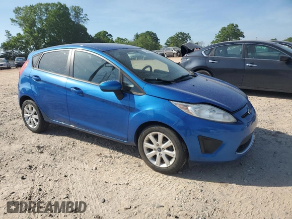 2011 Ford Fiesta SE with VIN 3FADP4EJ8BM141958, listed as a Copart auction lot 54503515 with 146,043 mi miles and Clean Title. Bid and sale history available at carsss.com. Image 4.
