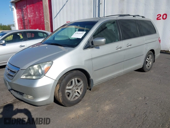 2005 Honda Odyssey TOURING with VIN 5FNRL38855B069043, listed as a IAAI auction lot 42035153 with 236,533 mi miles. Bid and sale history available at carsss.com. Image 2.