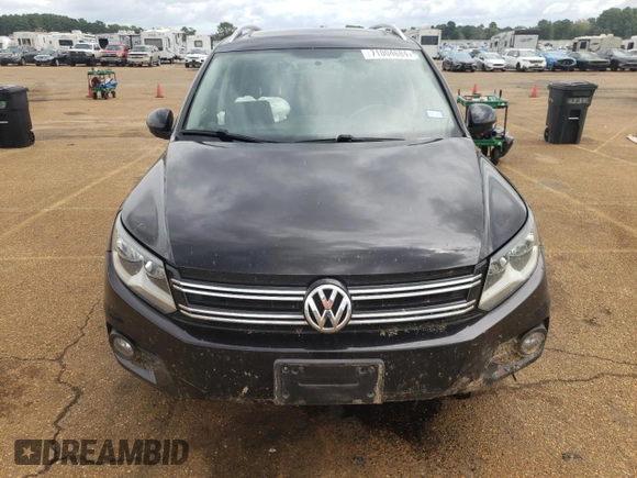 2014 Volkswagen Tiguan SEL with VIN WVGAV3AX5EW558929, listed as a Copart auction lot 71004684 with 125,628 mi miles and Clean title. Bid and sale history available at DreamBid. Image 5.