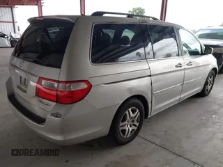 2005 Honda Odyssey EX-L with VIN 5FNRL38615B026205, listed as a IAAI auction lot 42128729 with 172,260 mi miles. Bid and sale history available at carsss.com. Image 4.