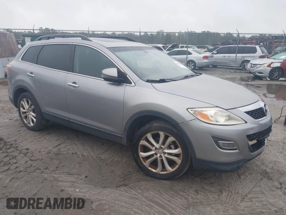 2012 Mazda CX-9 Grand Touring z VIN JM3TB2DA5C0363864, wystawiony jako IAAI lot #41896080 z przebiegiem 287 420 mil mil oraz . Historia ofert i sprzedaży dostępna na DreamBid. Obrazek 1.