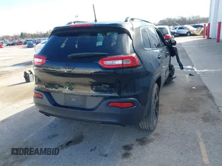 2017 Jeep Cherokee Sport with VIN 1C4PJMAB4HW664474, listed as a IAAI auction lot 41811736 with 102,301 mi miles. Bid and sale history available at carsss.com. Image 4.